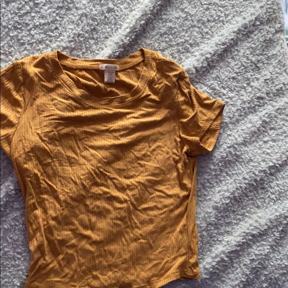 mustard yellow top(could look kind of cropped)